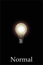 Image of light bulb on black background with normal vision.